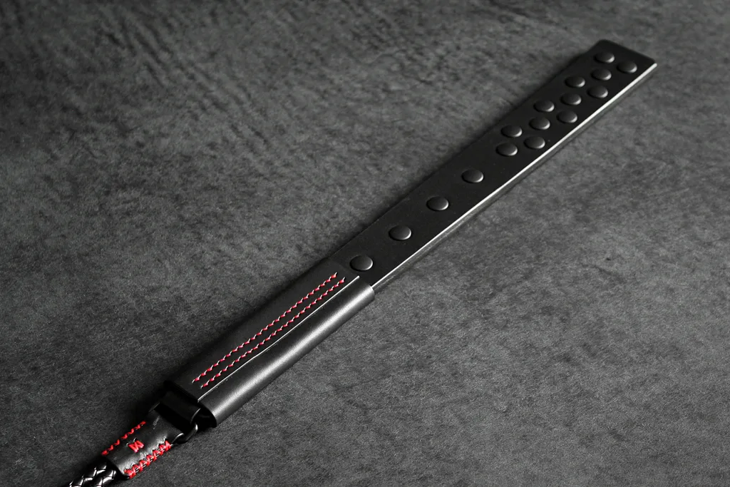 paddle cuir bdsm